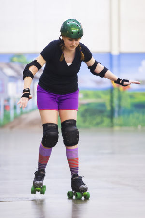 Reporter Skates After Her Derby Girl Dreams : News-Sentinel reporter Sara Jane Pohlman is unsteady on her skates as she slowly makes her way around the rink.
 - Photo by Dan Evans/News-Sentinel