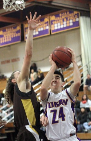 Boys basketball: Tigers use big third quarter to roll past Delta Kings 