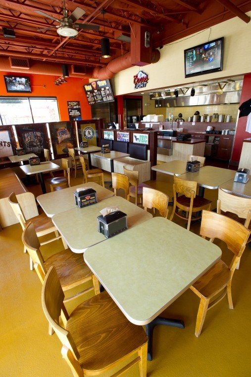 Slather wings in barbecue, spicy, parmesan at Phoenix Wings n’ Strips