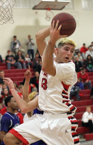 Boys basketball: Flames survive Bruins’ comeback 