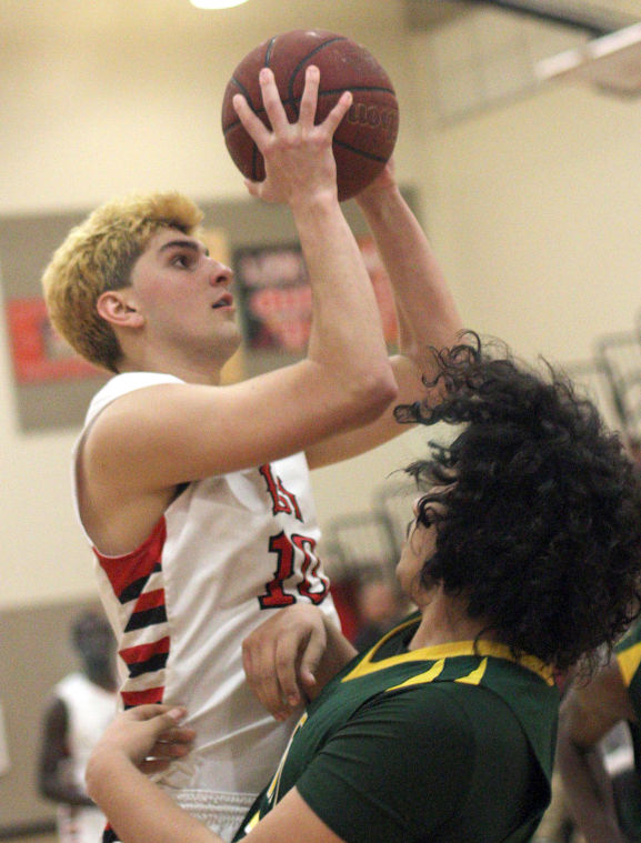 Boys basketball: Benjamin Simi, Flames dominate Yellowjackets 