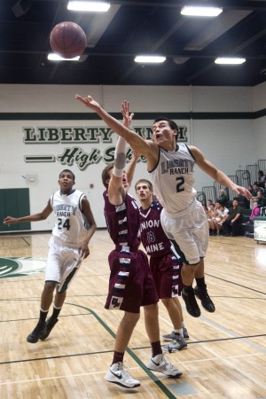 Boys basketball: Hawks soar in second half