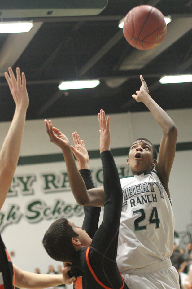 Boys basketball: Hawks hold off Cougars and make history