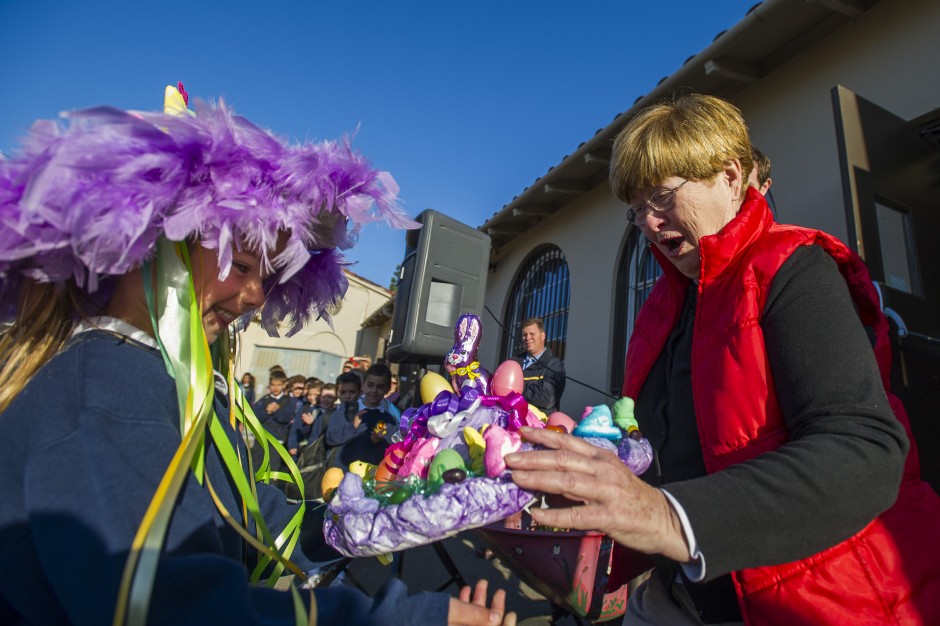 Molly Thurlow, 5, marches in St. Anne’s School parade founded by her grandmother