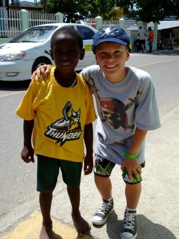 Taylor and a new Thunder fan in Roatan, Honduras