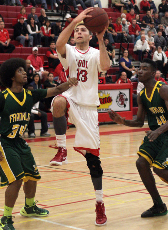 Boys basketball: Benjamin Simi, Flames dominate Yellowjackets 