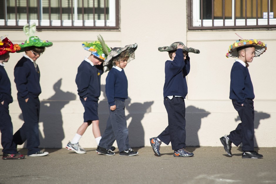 Molly Thurlow, 5, marches in St. Anne’s School parade founded by her grandmother