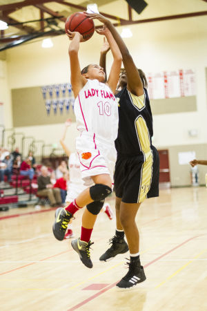 Girls basketball: Flames fade in second half 