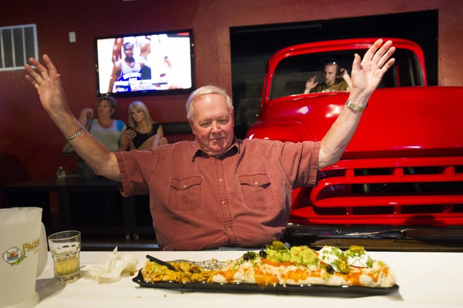 Lodi leaders try — and fail — to eat 6 pounds of beef and beans at sports grill’s opening