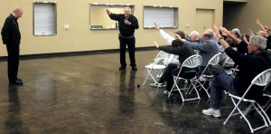 Father Michael Kelly speaks to supporters in Lockeford