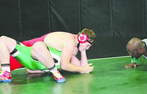 Wrestling: Flames take down Rams in TCAL opener