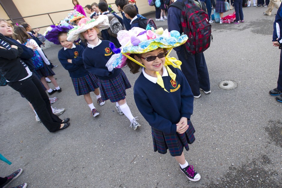 Molly Thurlow, 5, marches in St. Anne’s School parade founded by her grandmother