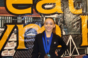 Lxana DeGrandmont earns Double Gold at Great West Gym Fest competition