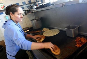 Breakfast burritos, cactus at restaurant inside gas station 
