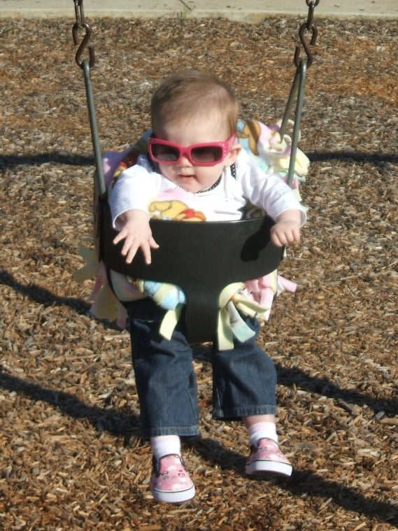 Emma's First Swing Ride
