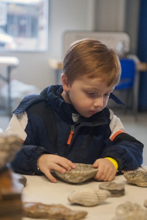 Kids get their hands dirty learning about fossils at World of Wonders