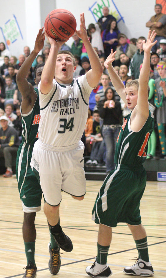 Boys basketball: Hawks too hot to handle