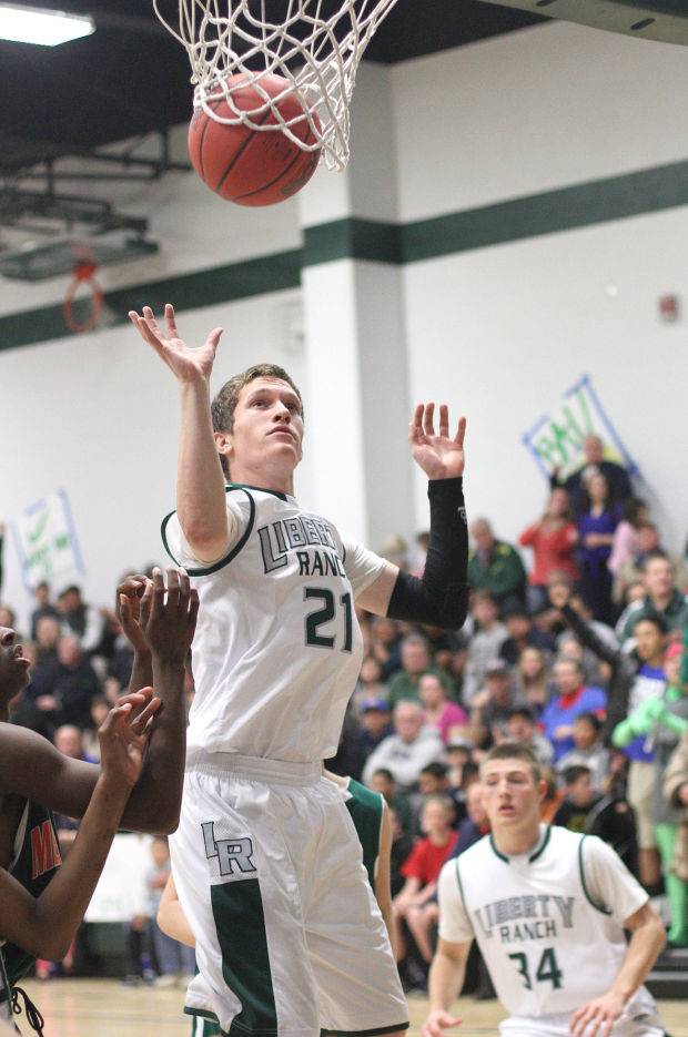 Boys basketball: Hawks too hot to handle