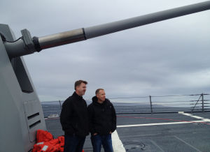 Two Lodi-area Men Spend Day On Destroyer To Learn What Navy Life Is Like: Ryan Sherman, left, and Russ Fields, center, discuss their experiences on a Naval destroyer 80 miles in the Pacific west of San Diego on Dec. 18, 2012.
 - Photo by Courtesy Photograph