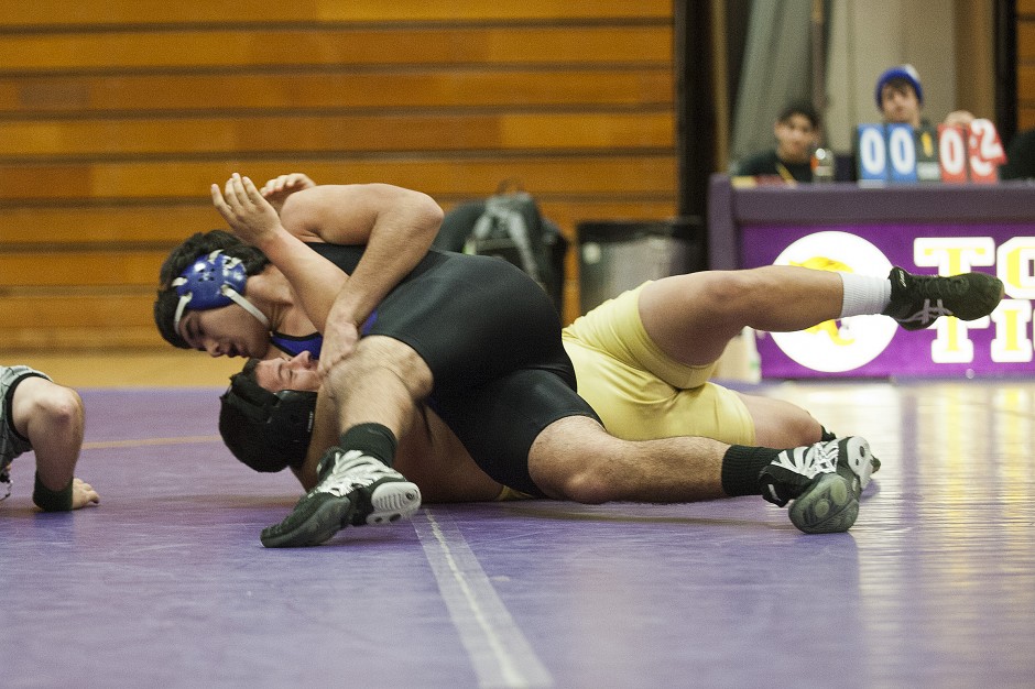 Wrestling: Flames, Tigers sweep the mat