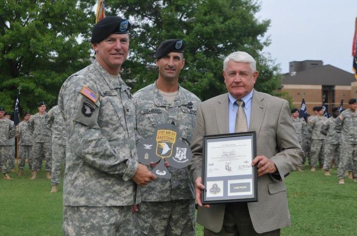Jim Wilson accepts the honor of Distinguished Member of the Regiment 