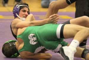 Wrestling: Tigers take down Rams in a rout 