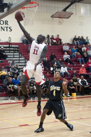 Boys basketball: Flames topple Titans
