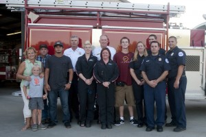 Teen gives awards to Clements firefighters, EMTs who saved his life