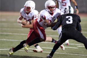 Flames fade late, fall to Huskies in opener 