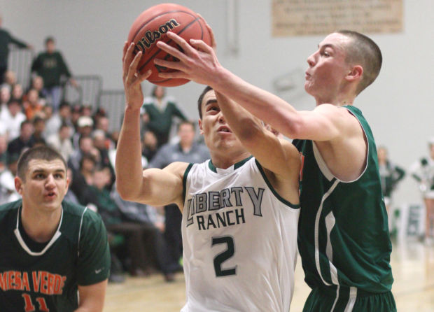 Boys basketball: Hawks too hot to handle