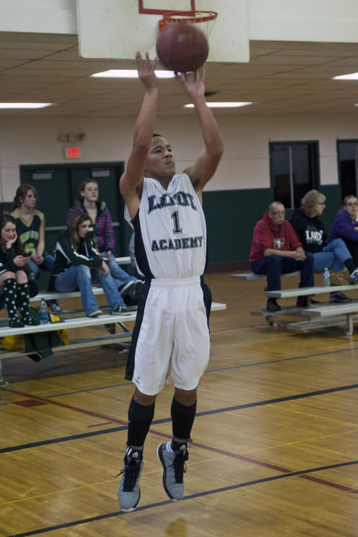 Boys basketball: Titans rout Eagles 