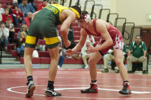 Wrestling: Flames rumble past Bulldogs 