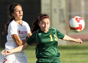 Despite loss in league opener, Flames still shooting for girls soccer title