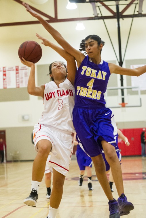 Girls basketball: Flames hold off Tigers’ late charge in thrilling finish 
