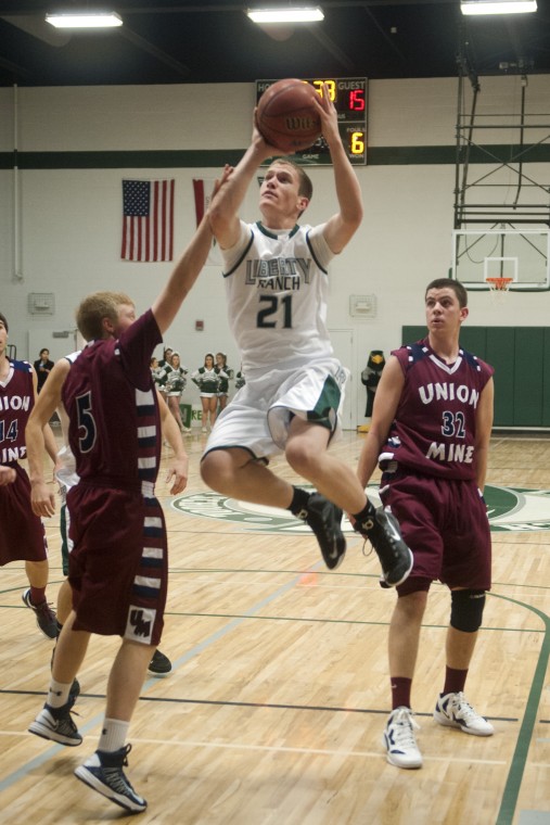 Boys basketball: Hawks soar in second half