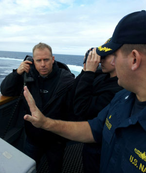 Two Lodi-area Men Spend Day On Destroyer To Learn What Navy Life Is Like: Russ Fields with the ship's commander 80 miles west of San Diego on Dec. 18, 2012.
 - Photo by Courtesy Photograph