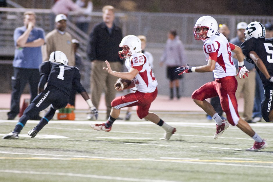 Flames fade late, fall to Huskies in opener 