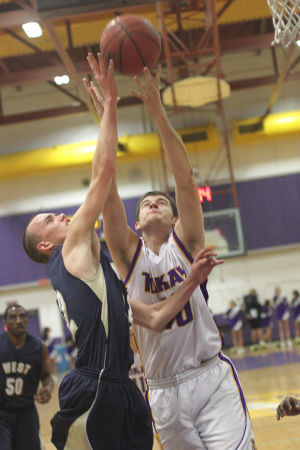 Boys basketball: Another close defeat drops Tigers to 0-2 