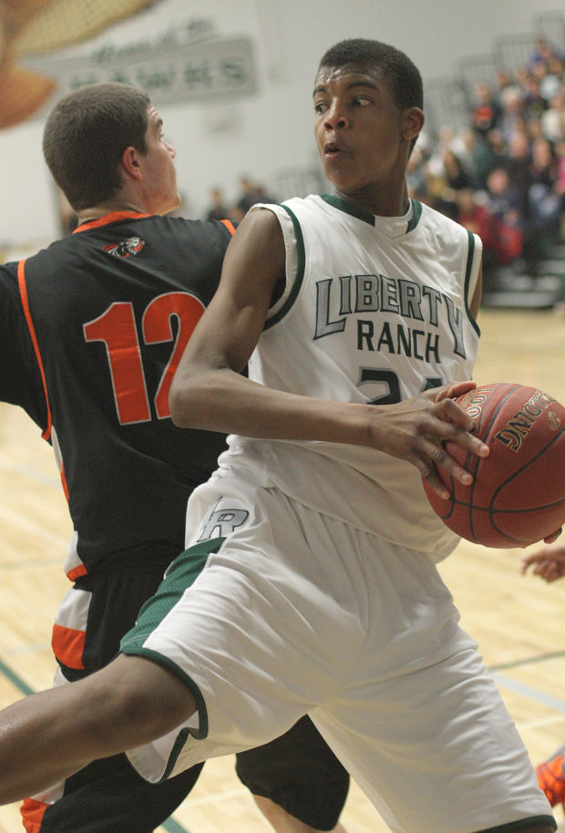Boys basketball: Hawks hold off Cougars and make history