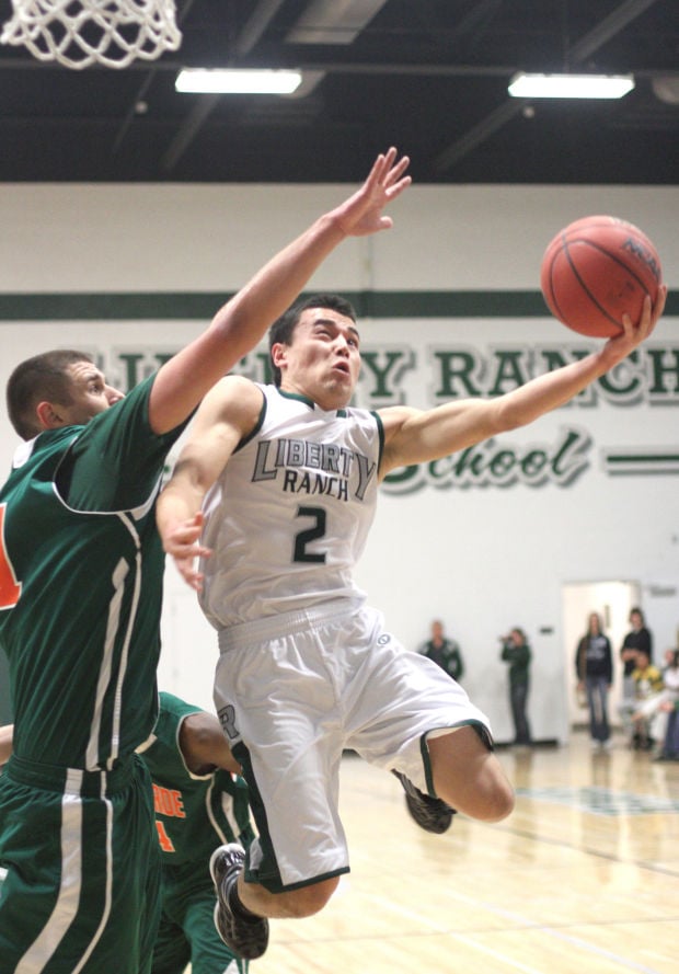 Boys basketball: Hawks too hot to handle