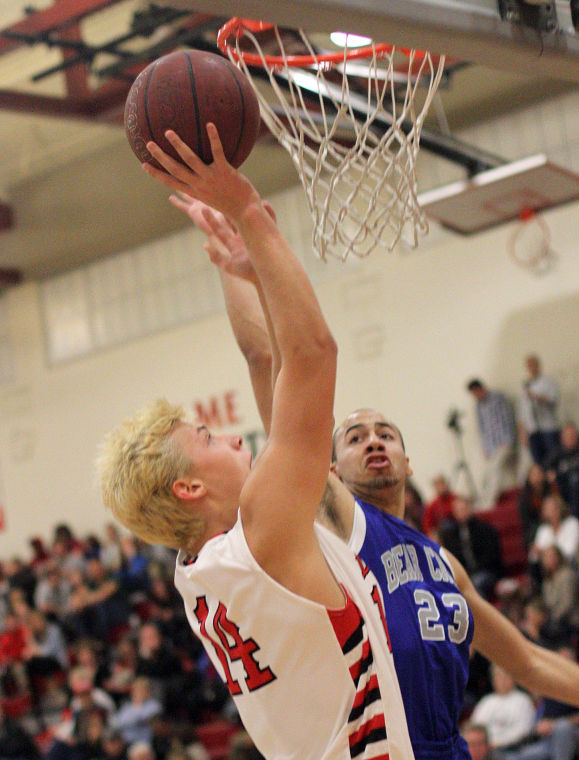 Boys basketball: Flames survive Bruins’ comeback 