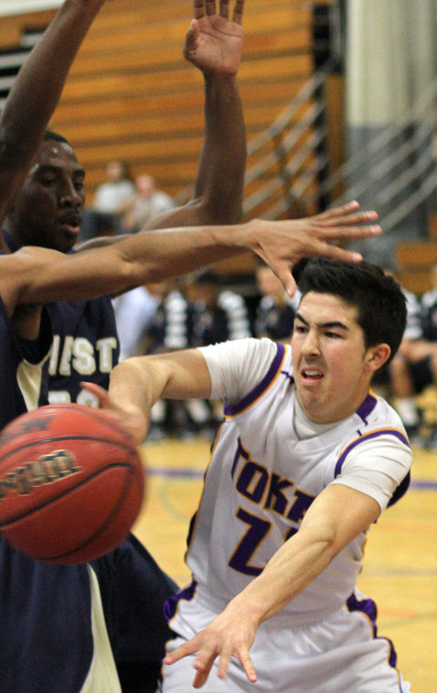 Boys basketball: Another close defeat drops Tigers to 0-2 