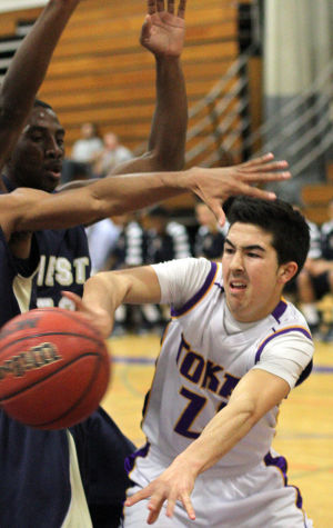 Boys basketball: Another close defeat drops Tigers to 0-2 