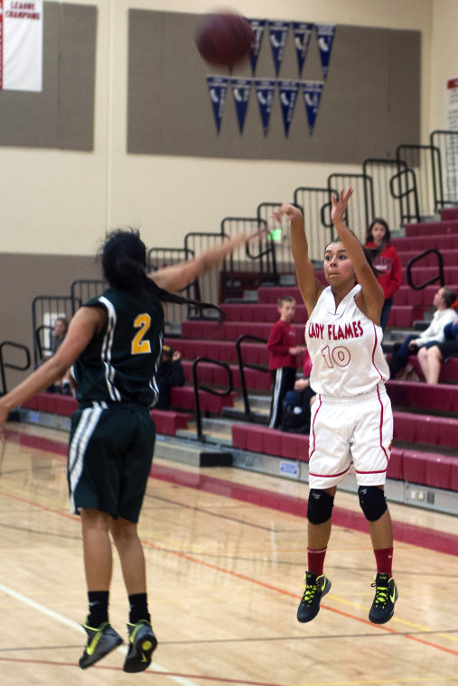 Girls basketball: Flames let large lead slip away, remain winless in league play 