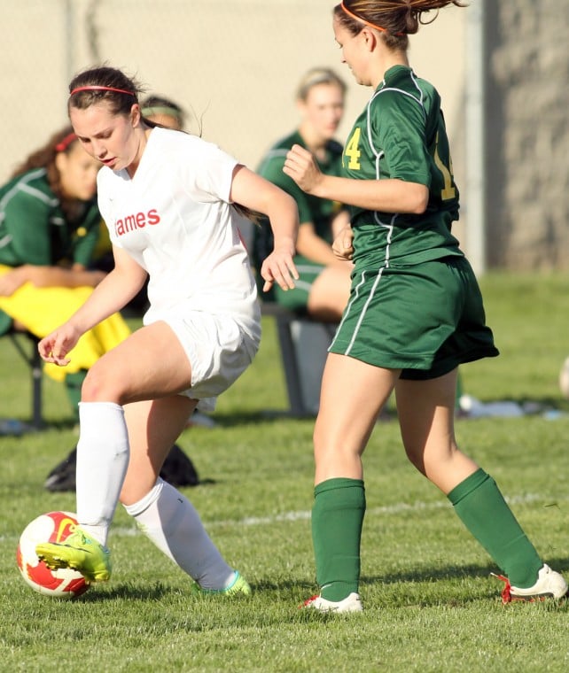 Despite loss in league opener, Flames still shooting for girls soccer title