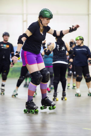 Reporter Skates After Her Derby Girl Dreams : News-Sentinel reporter Sara Jane Pohlman is unsteady on her skates as she slowly makes her way around the rink.
 - Photo by Dan Evans/News-Sentinel