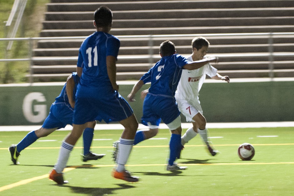 Flames hitting their stride as boys soccer playoff race heats up 