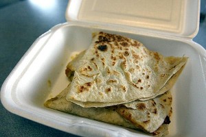 Breakfast burritos, cactus at restaurant inside gas station 