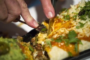 Lodi leaders try — and fail — to eat 6 pounds of beef and beans at sports grill’s opening