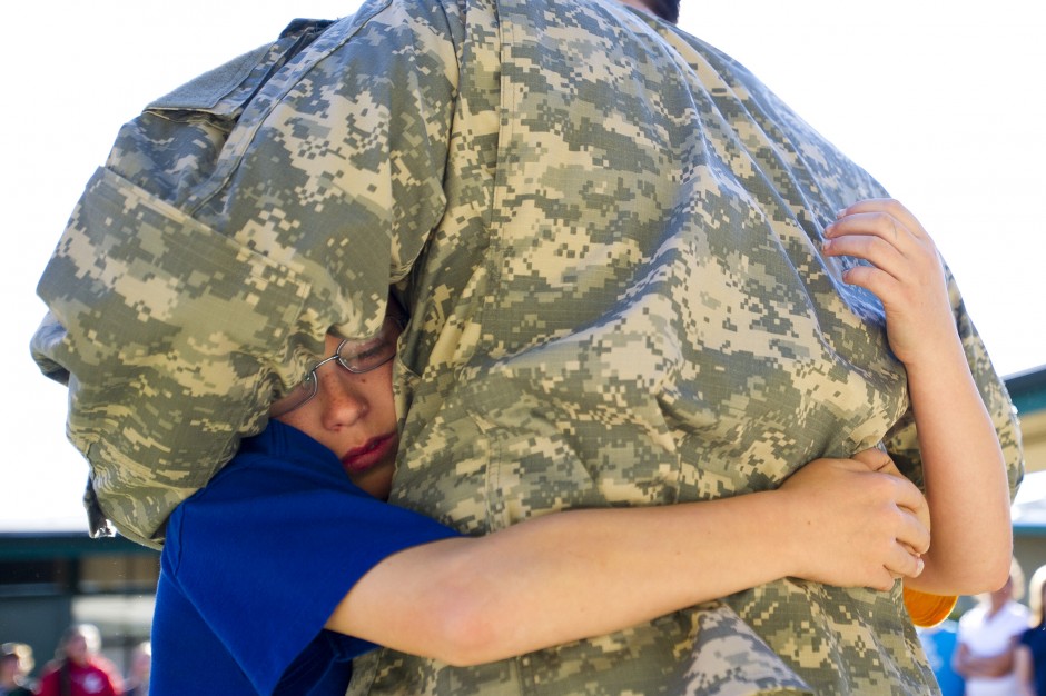 Soldier surprises his kids at school while on leave for the holidays